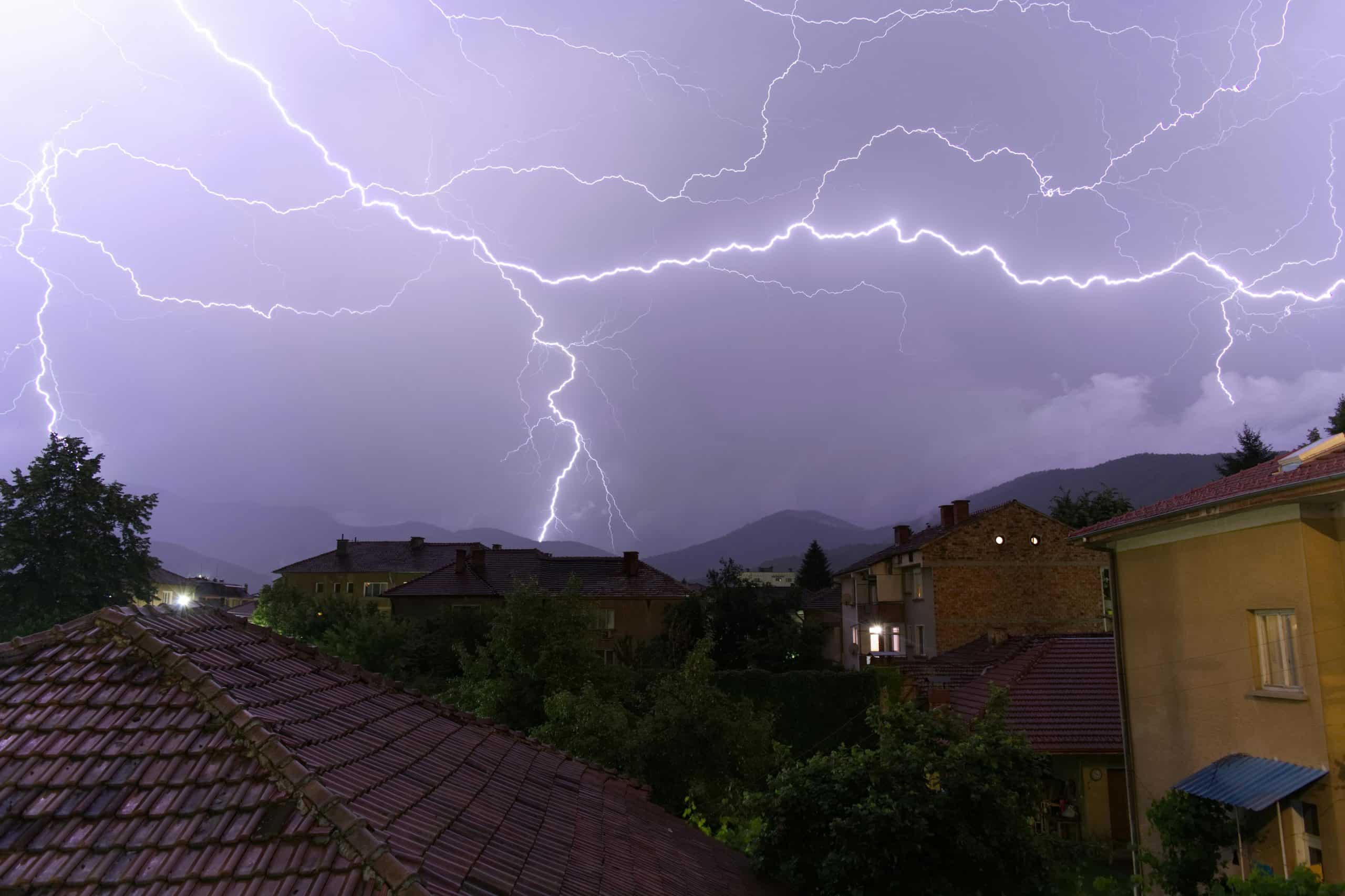 Roofs under a stormy sky
